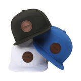 New Design Multi-panel Flat Brim Laser Perforated Sport Cap With Leather Patch Logo